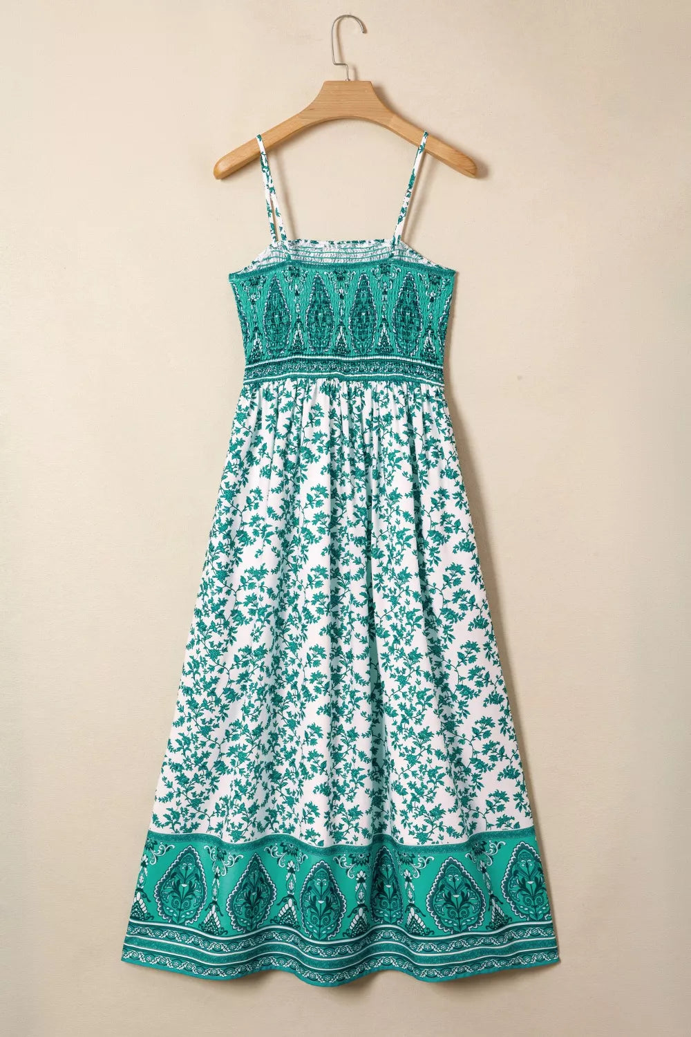Turquoise-and-white floral shirred cami maxi dress on hanger