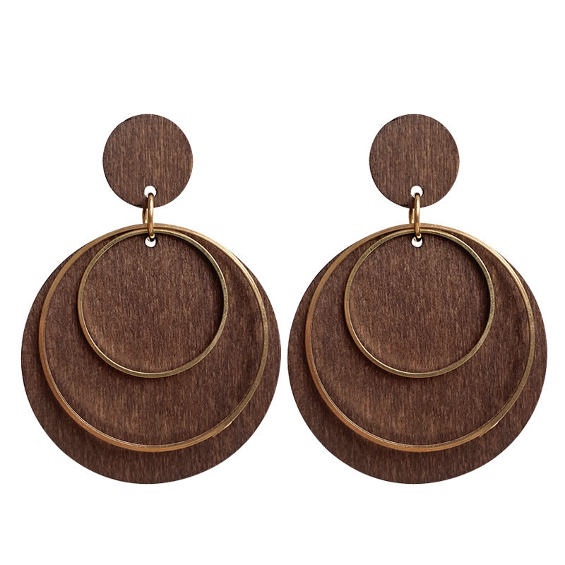 Geometric drop earrings: brown round studs with double gold-tone ring drop