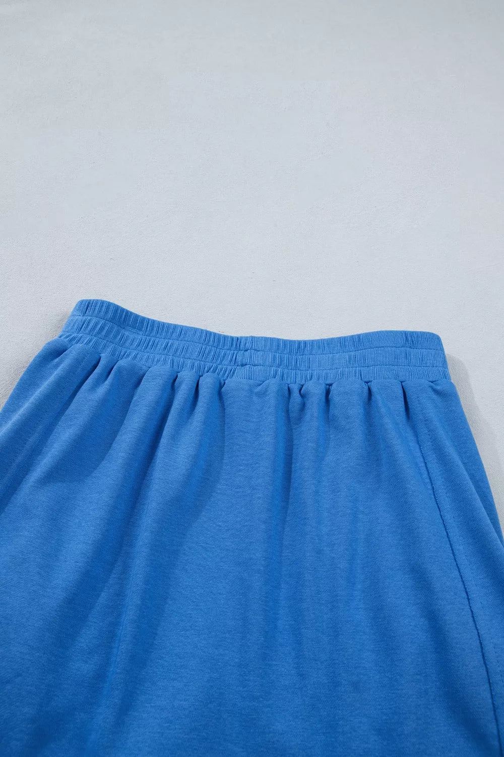 Blue skort skirt with elastic waistband and gathered pleats