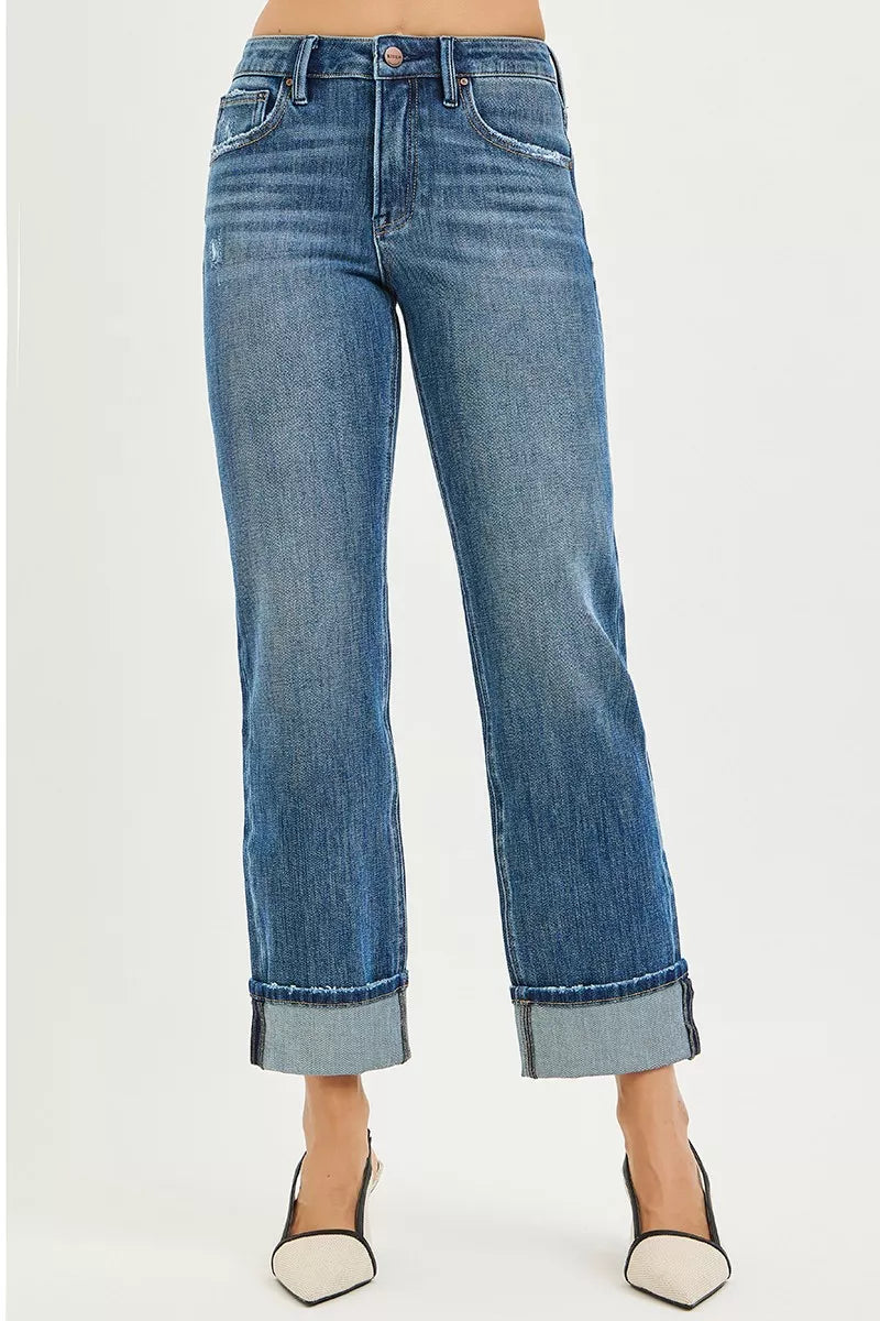 Dark blue button-fly straight-leg jeans with cuffed hems and belt loops