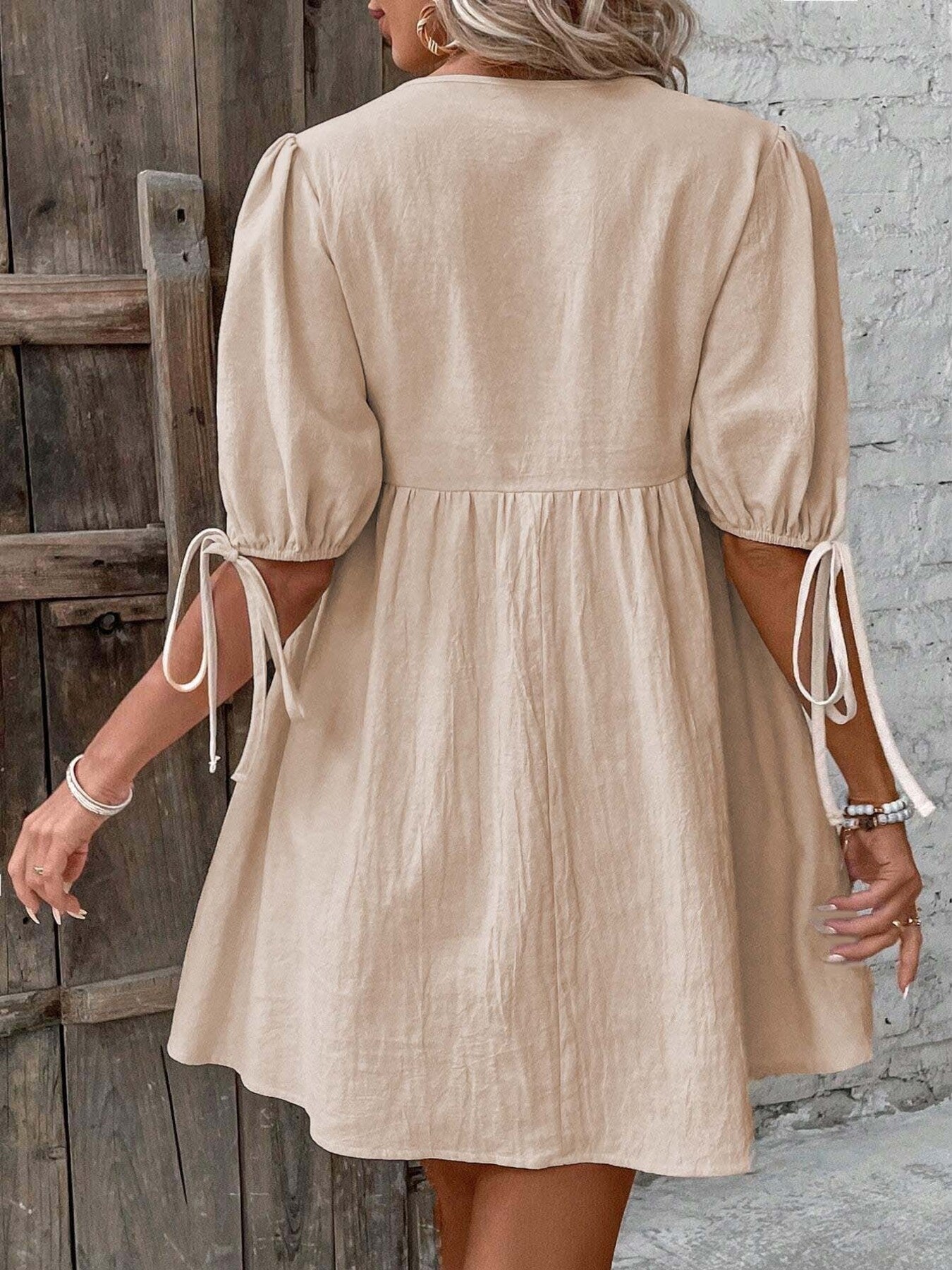 Khaki mini dress, tie details at sleeves, gathered back, puff sleeves