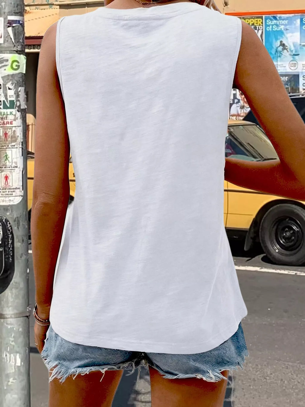 White sleeveless tank top with plain back and rounded neckline
