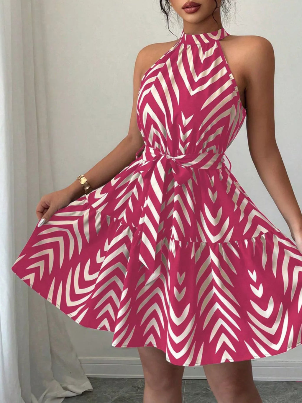 Rose red zebra-print halter neck tie-waist dress with full skirt and ruffled hem