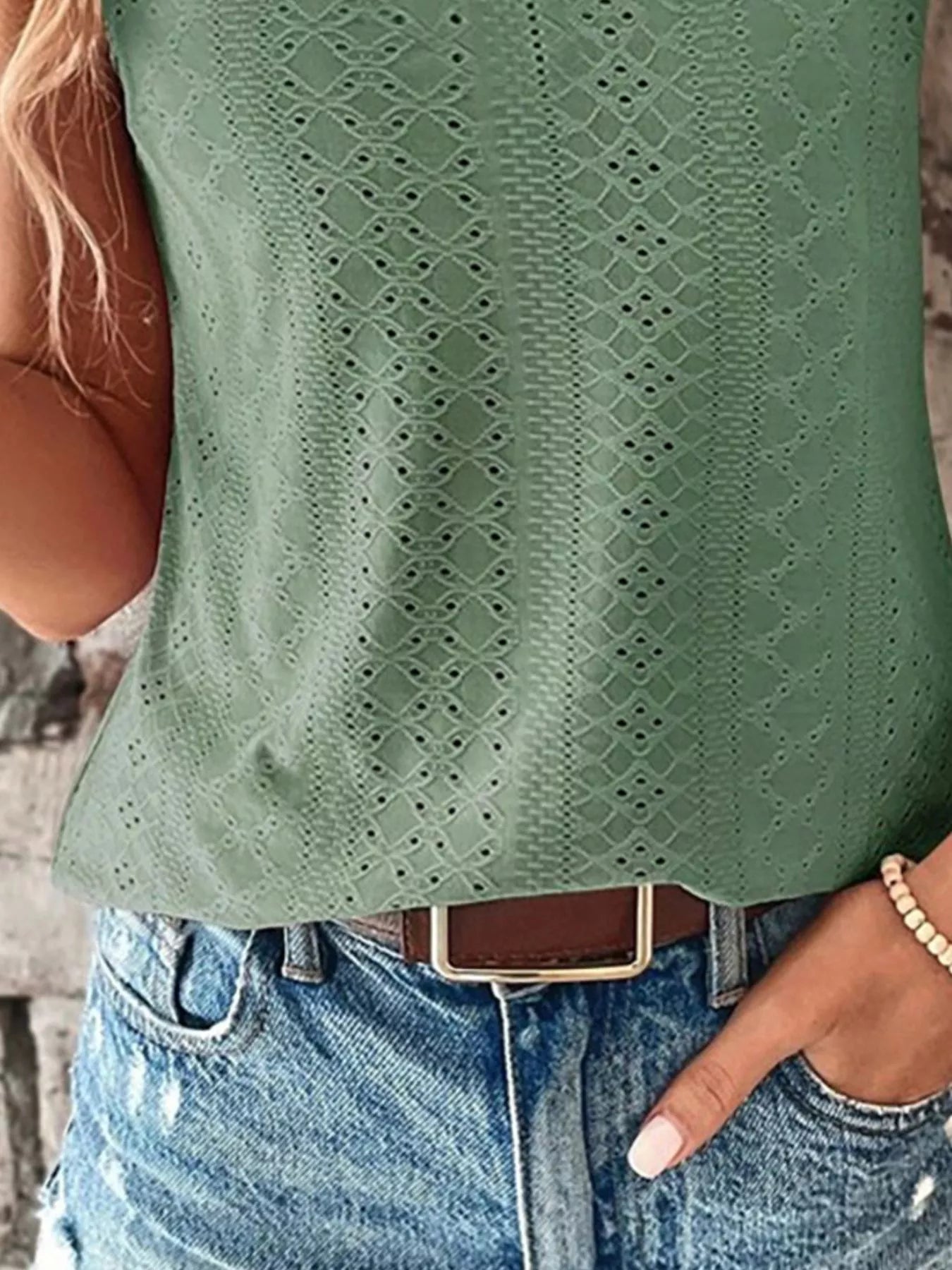 Sage green eyelet lace sleeveless V-neck tank top with vertical embroidered cutout pattern.
