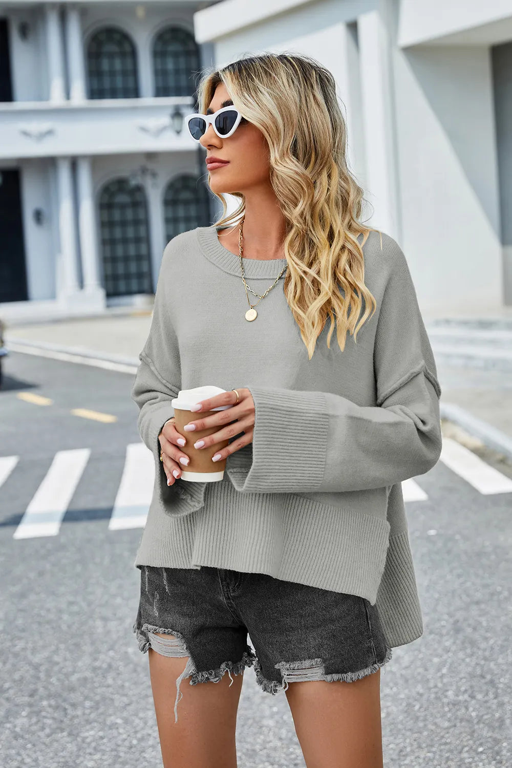 High-low slit sweater, light gray long sleeves with crew neckline and ribbed bottom