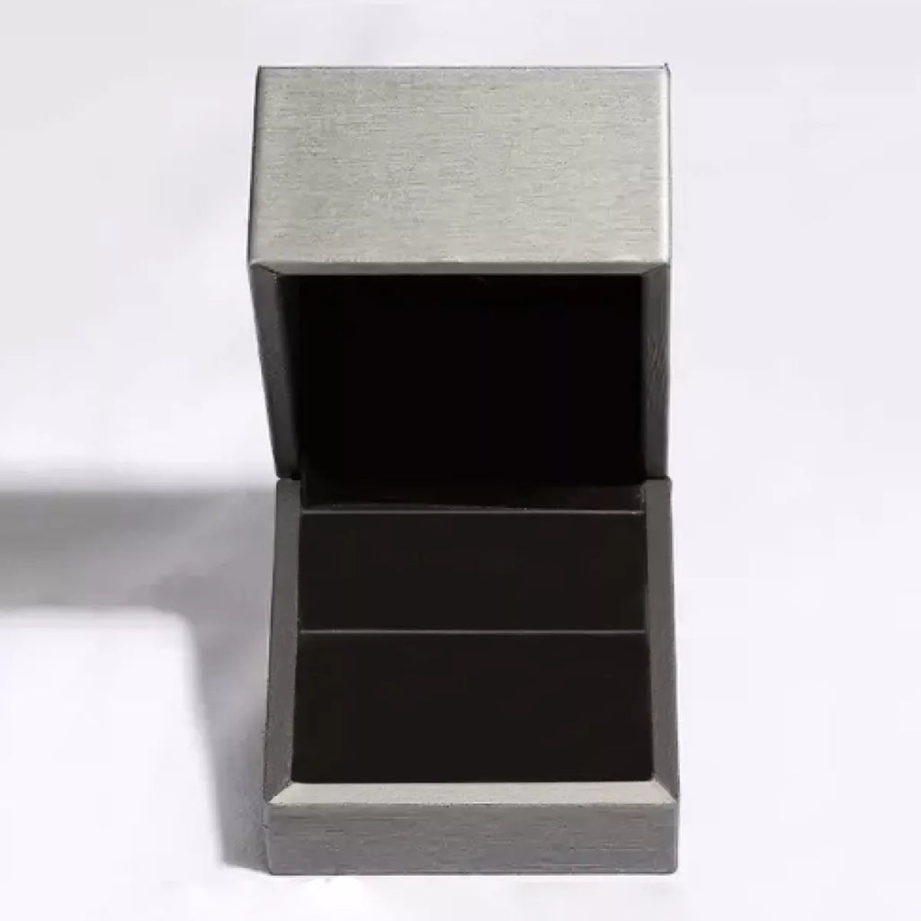 Jewelry box for 925 sterling silver zircon ring with dark insert and hinged lid