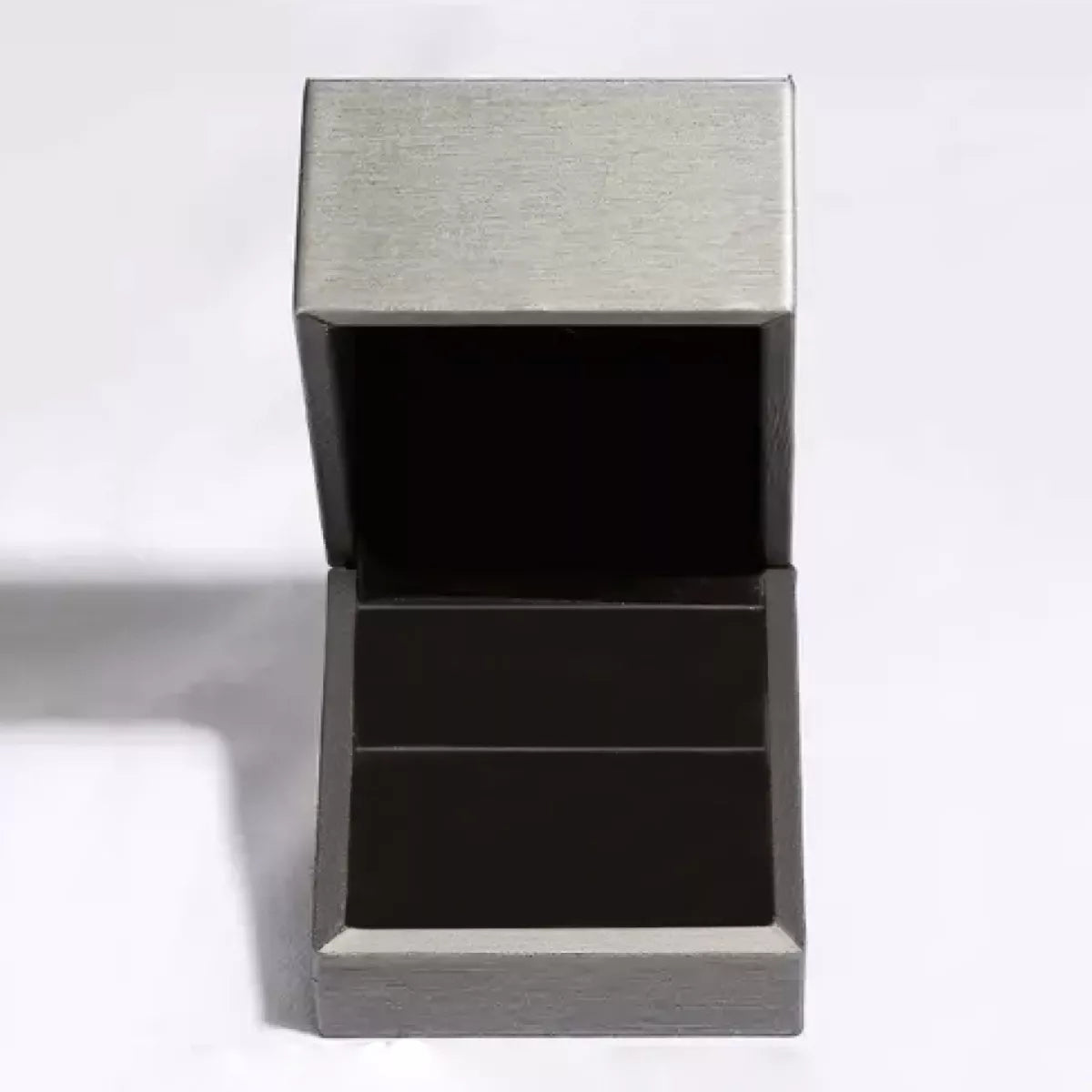 Jewelry box for 925 sterling silver zircon ring with dark insert and hinged lid