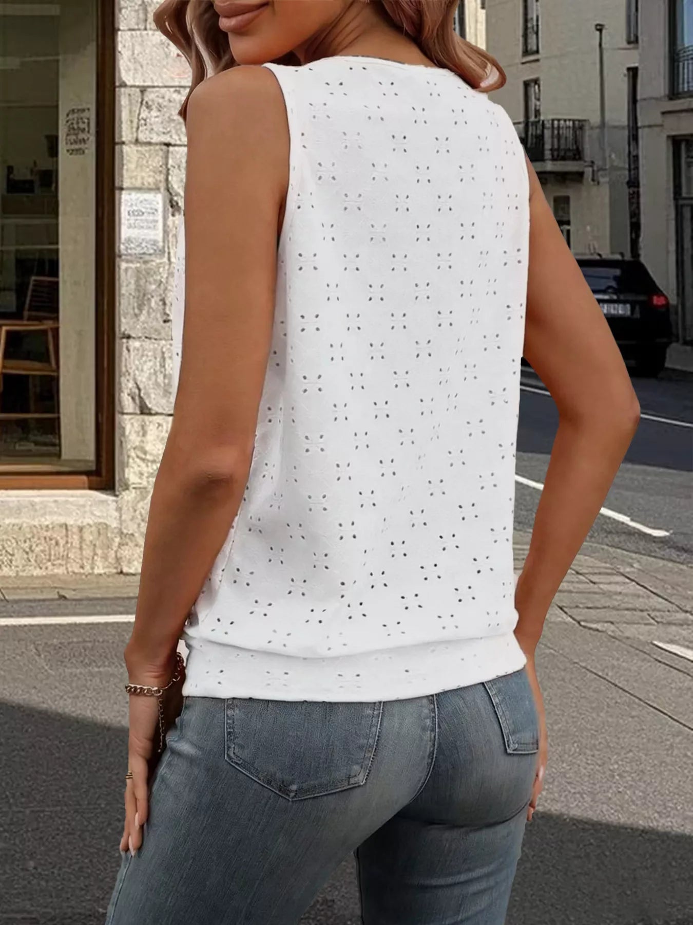 White eyelet sleeveless cami, rounded neckline, textured allover pattern
