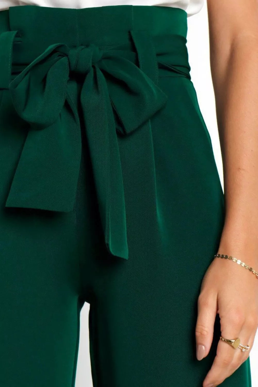 High waist tie-front pants in dark green with tied bow at front waist