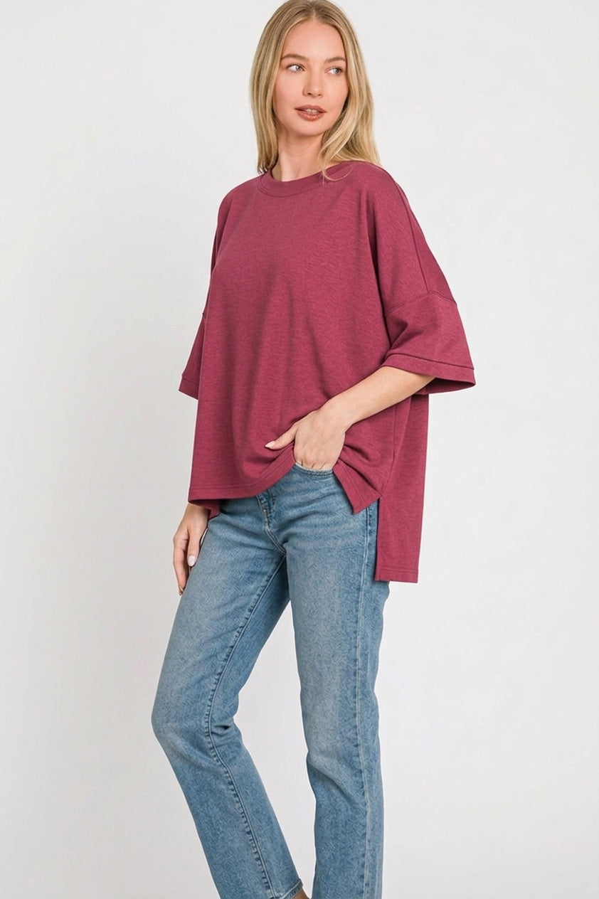 Plus size cabernet red scuba knit top with side slit detail and short sleeves