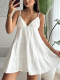 White V-neck tiered mini dress with lace-trim straps and smocked bodice