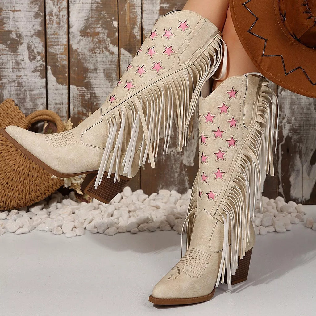 Ivory western boots with pink stars, stacked block heel, and sweeping white fringe