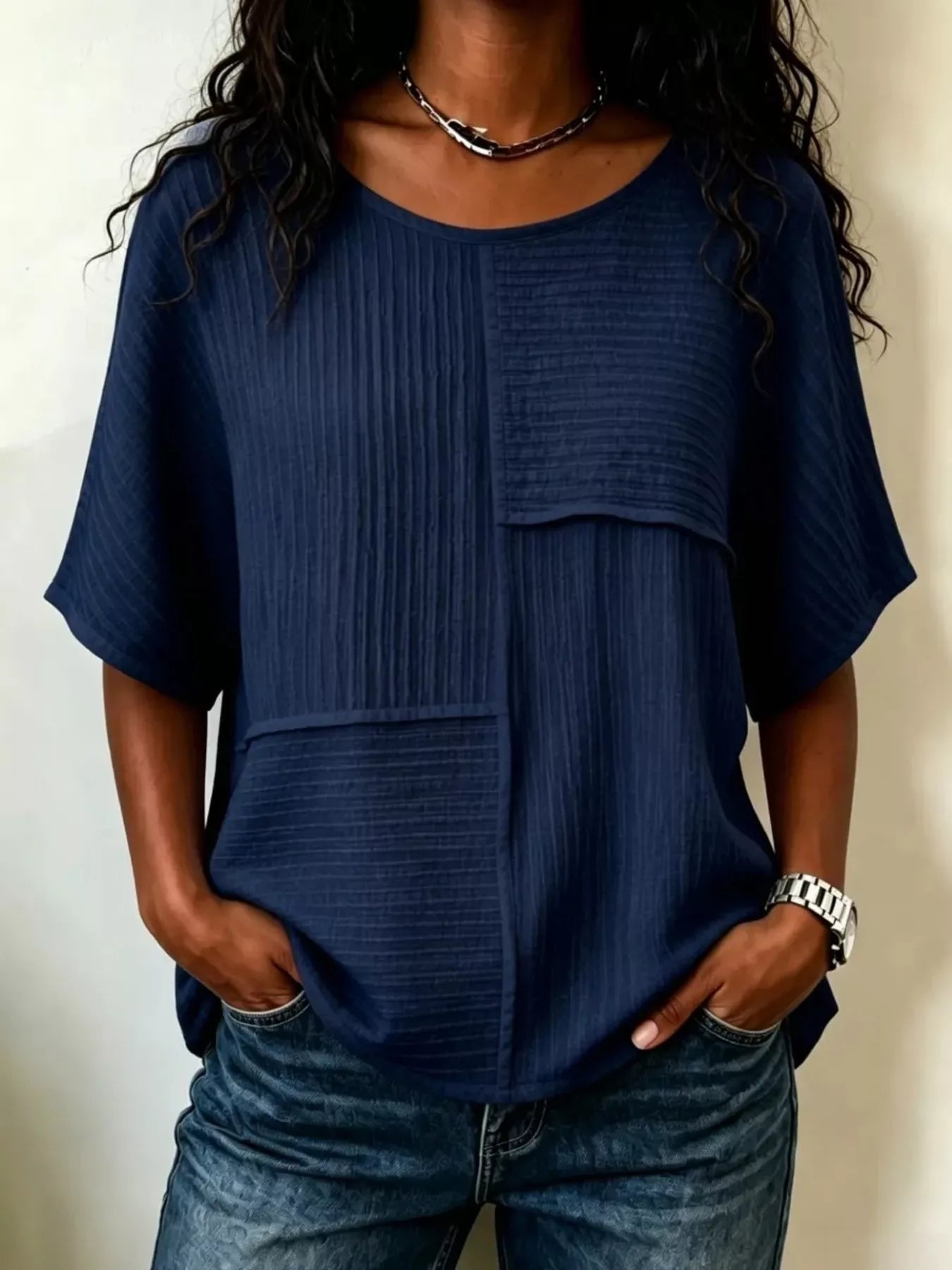 Textured round-neck half-sleeve blouse, navy blue with front patch pockets and button placket