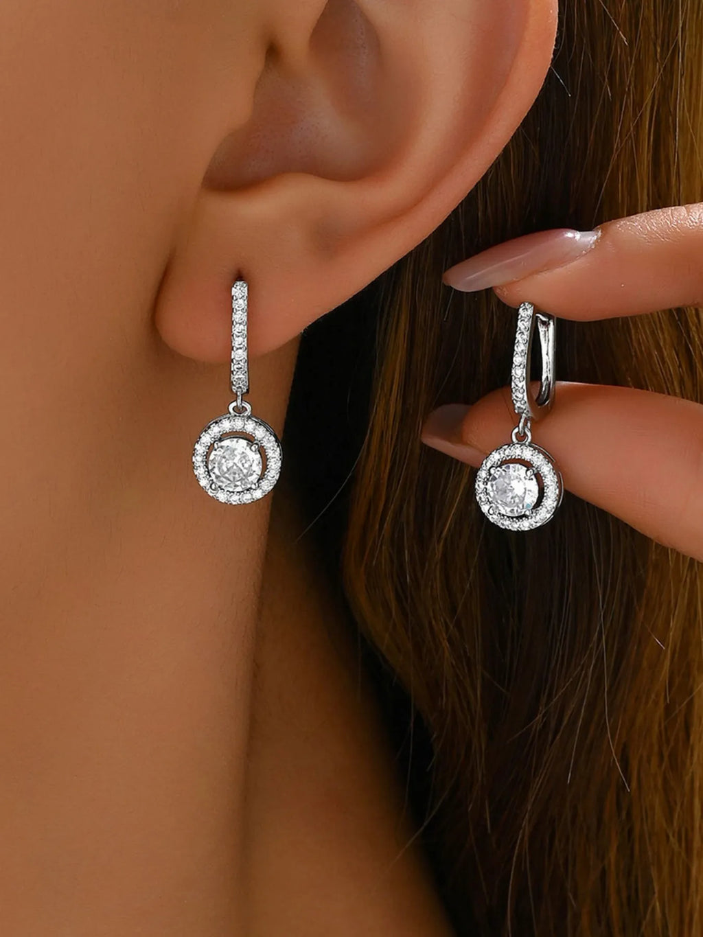 Silver zircon drop earrings with round halo pendant and textured hoop top