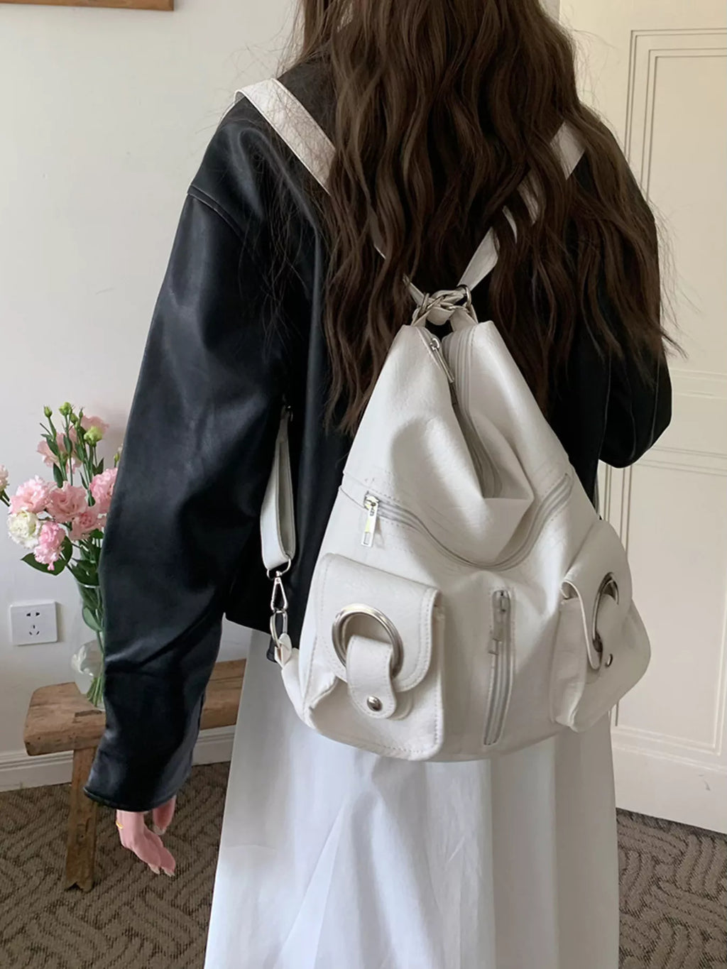 Convertible pocket handbag, white; crossbody style with ring pull tabs and zip front