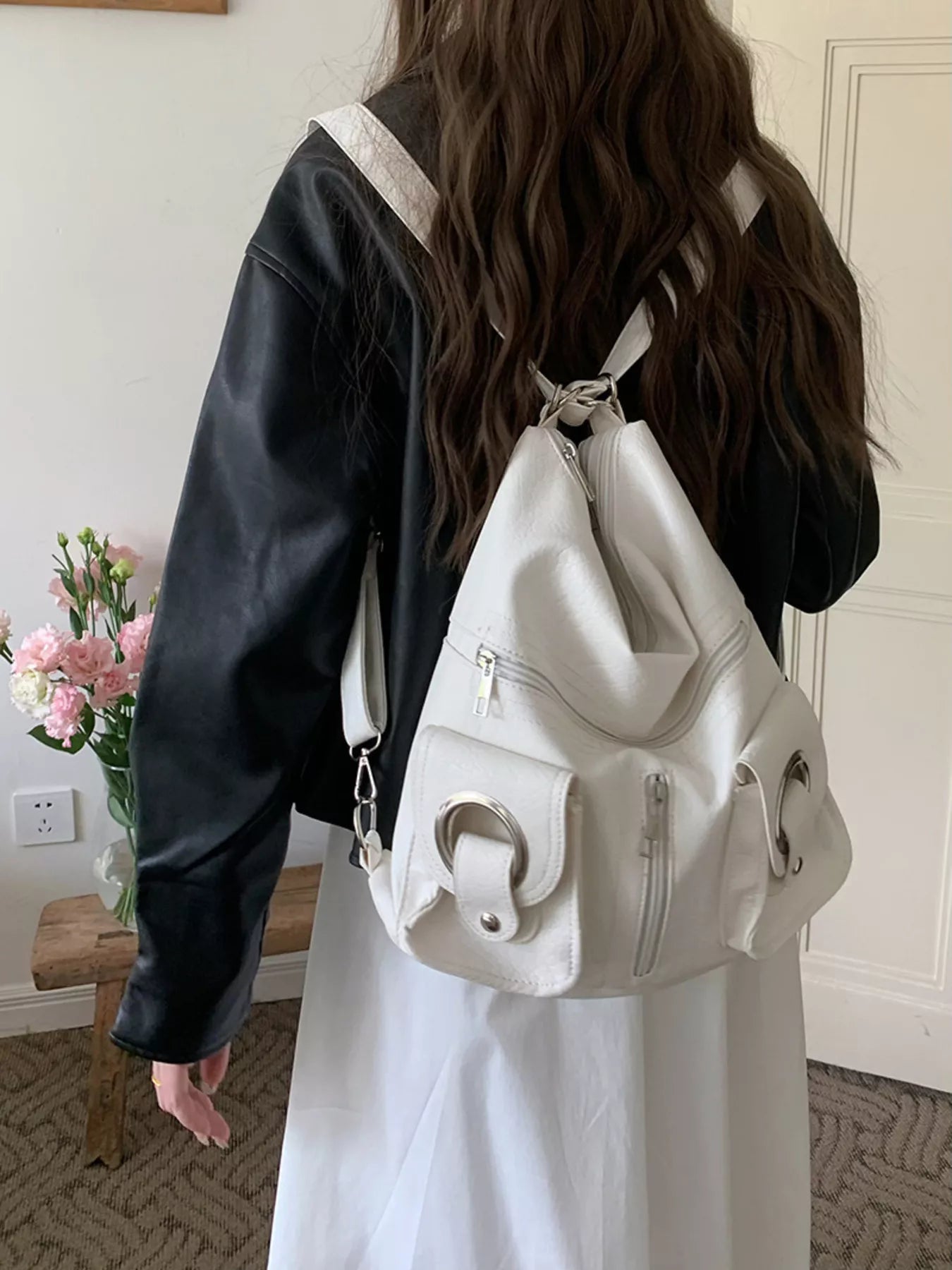Convertible pocket handbag, white; crossbody style with ring pull tabs and zip front