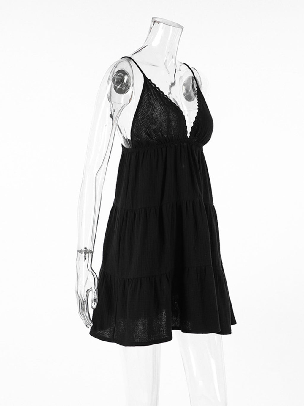 Black V-neck tiered mini dress with lace trim and layered tier skirt