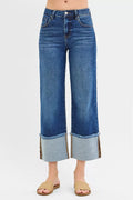 Dark blue mid-rise wide crop jeans with cuffed hems and button-fly front