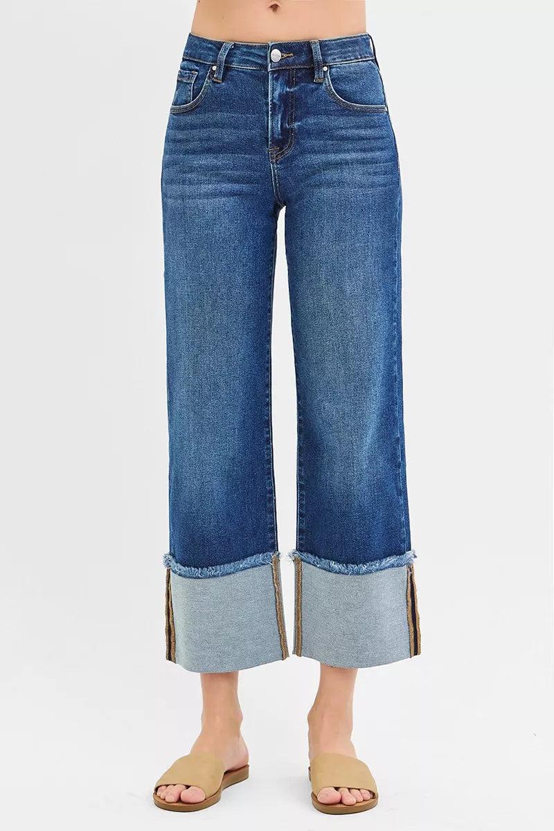 Dark blue mid-rise wide crop jeans with cuffed hems and button-fly front