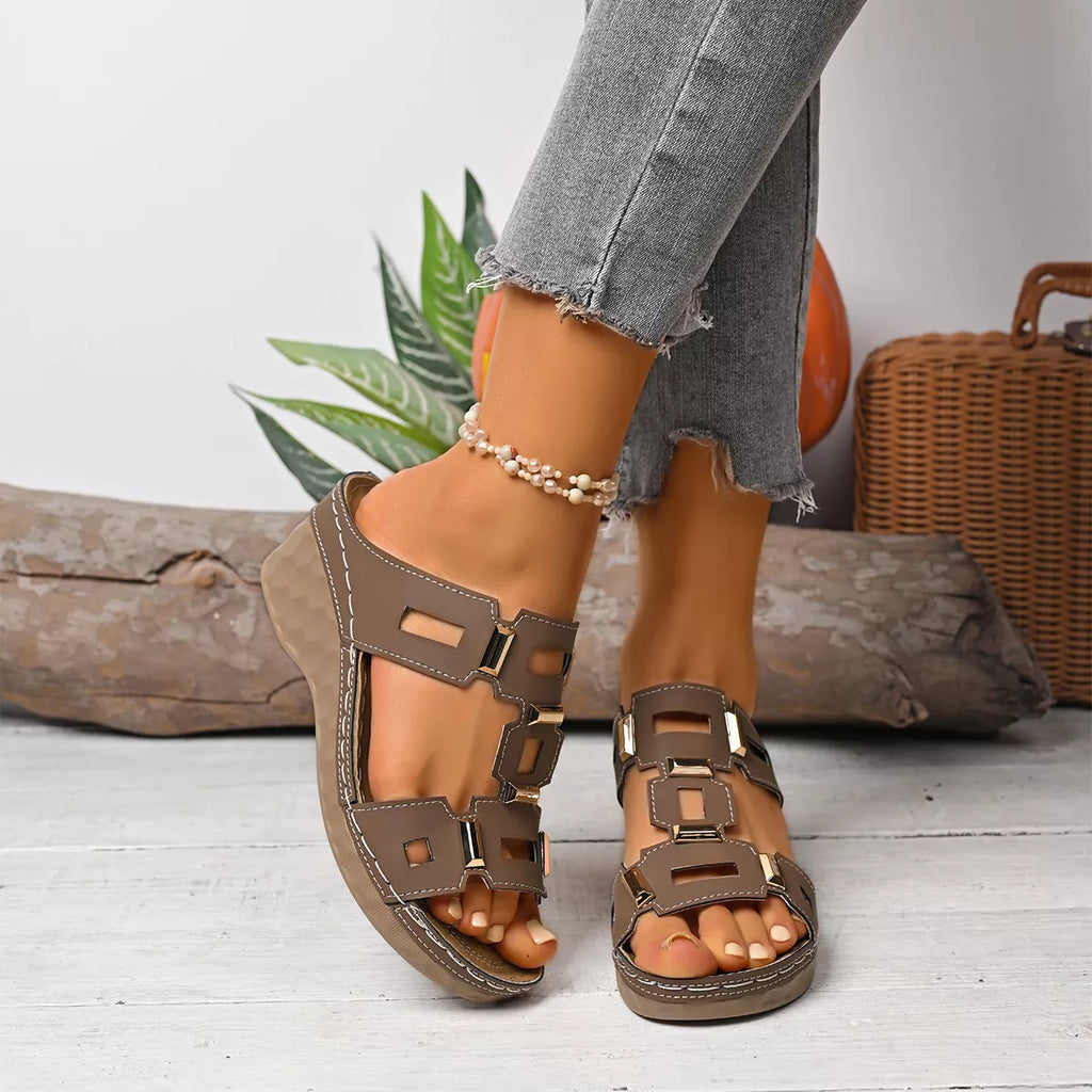 Open-toe wedge sandal in dark brown with chunky buckle straps and open toes
