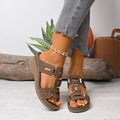 Open-toe wedge sandal in dark brown with chunky buckle straps and open toes