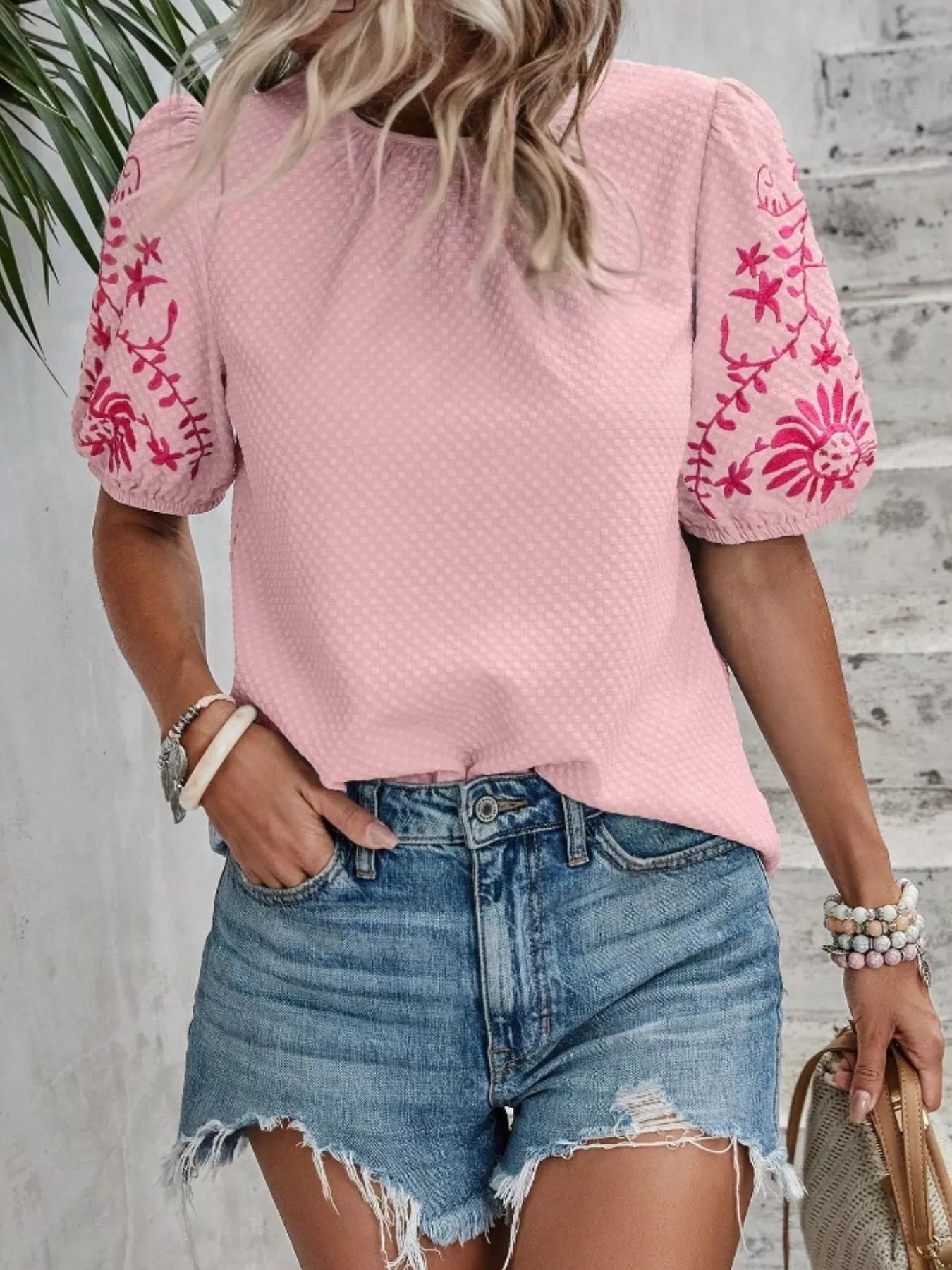 Embroidered puff sleeve blouse in pink with red floral stitch detailing
