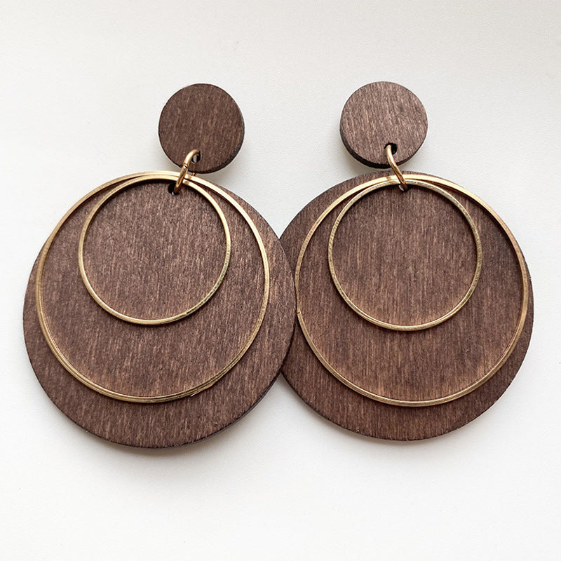 Geometric drop earrings with brown round discs and gold-tone circular hoops