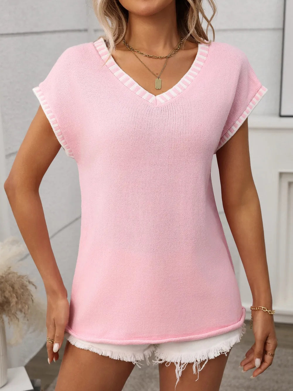 Blush pink knit V-neck short-sleeve top with striped contrast trim
