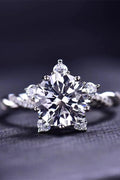 3-carat moissanite twisted ring with large round center stone and side accents, silver