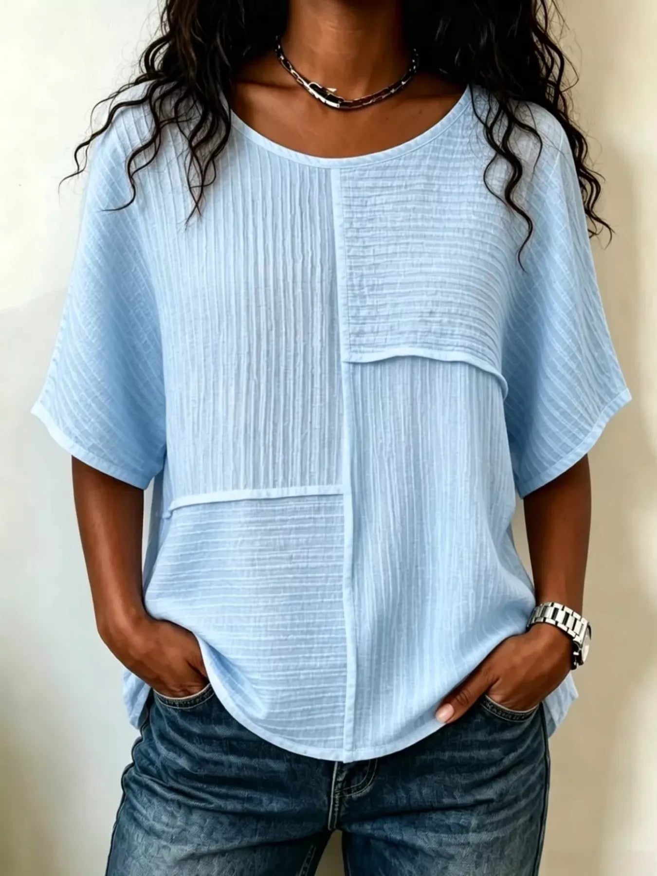 Textured round-neck half-sleeve blouse, light blue with front patch pockets and button placket