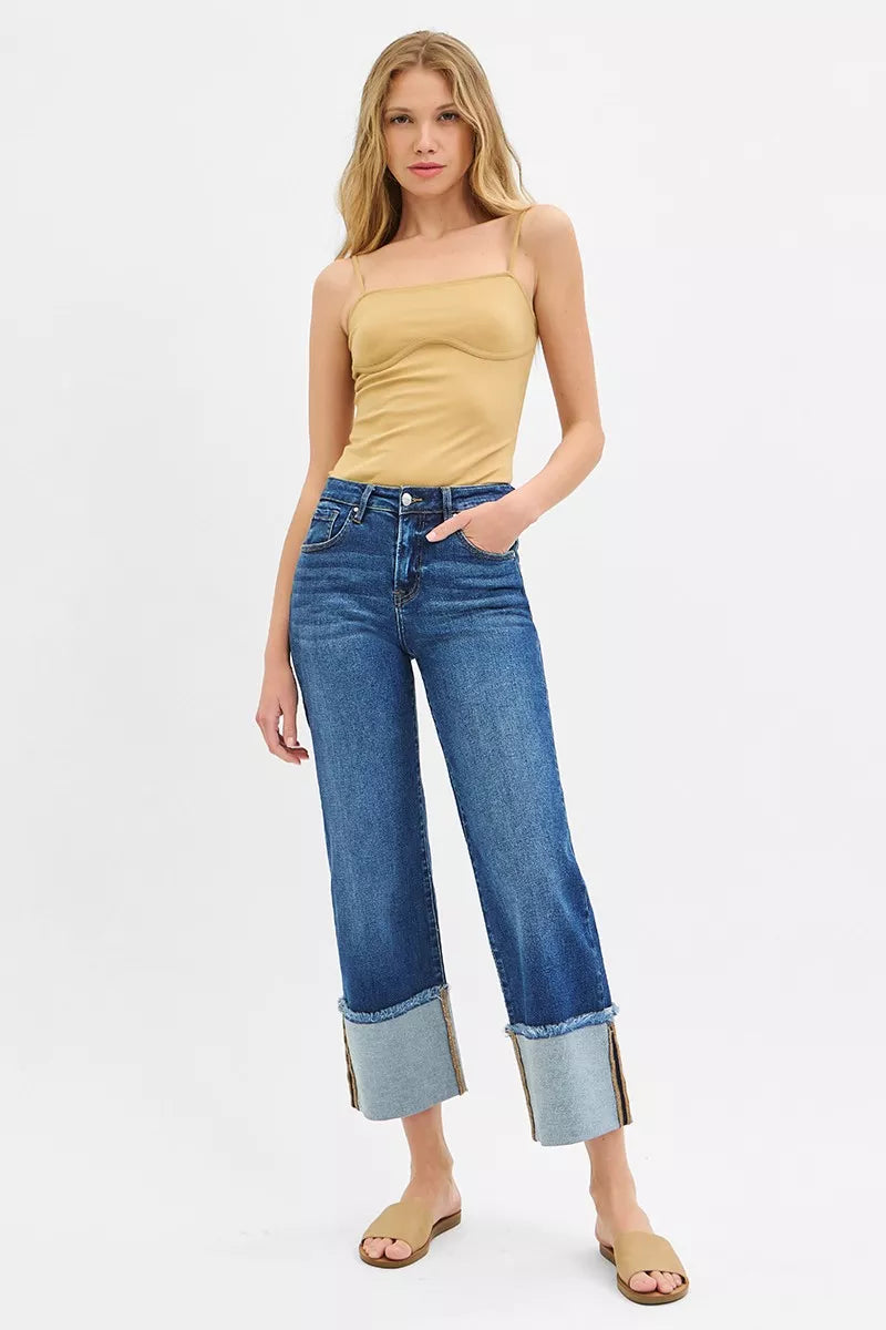 Dark blue mid-rise wide-leg crop jeans with cuffed hems and button fly