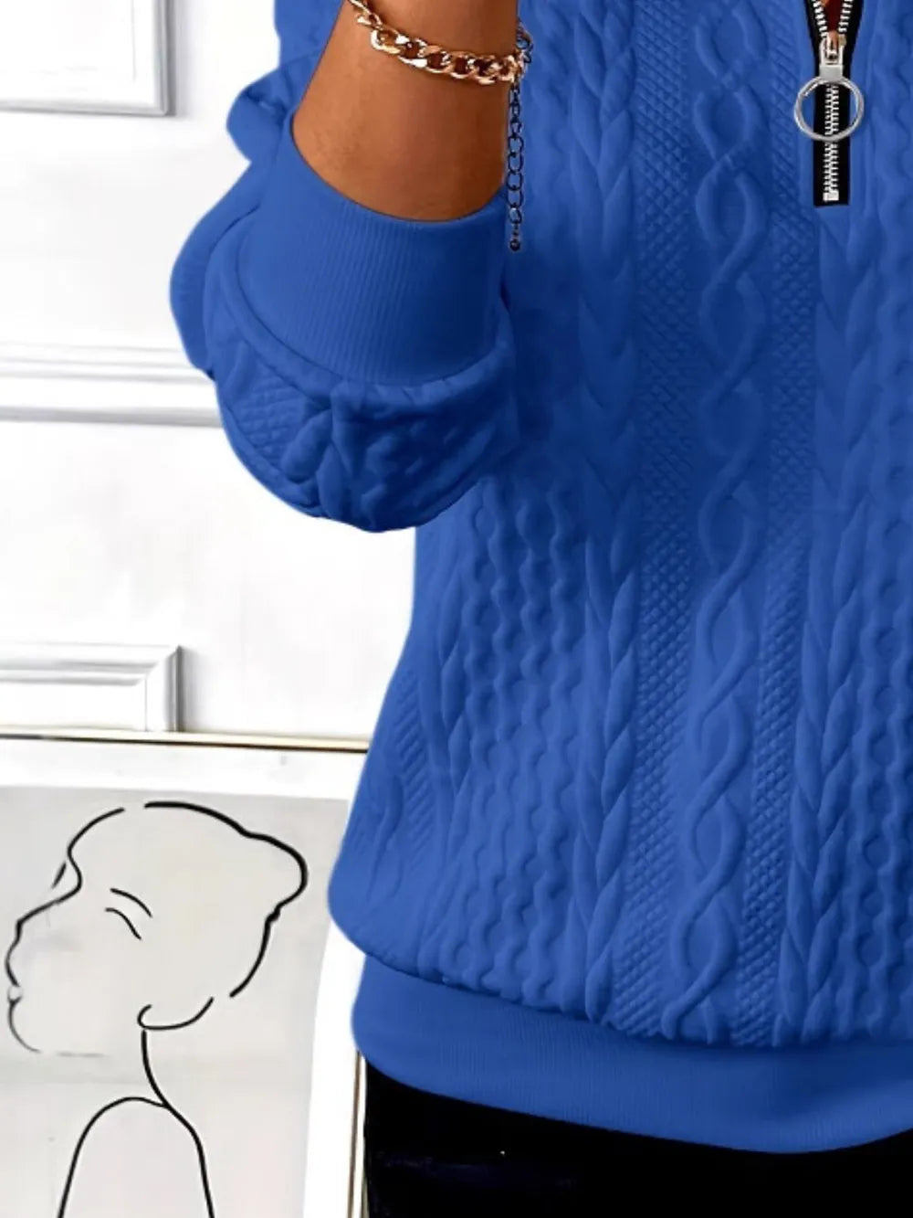 Royal blue textured long-sleeve sweatshirt with ribbed crew neckline and half-zip
