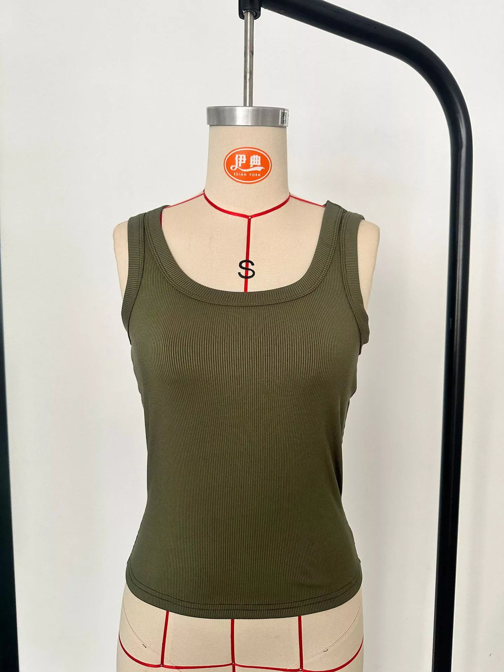 Olive green ribbed knit sleeveless tank top on hanger, scoop neck slim fit
