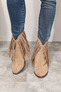 Khaki suede ankle boots with fringe and stacked heel, western cowboy style