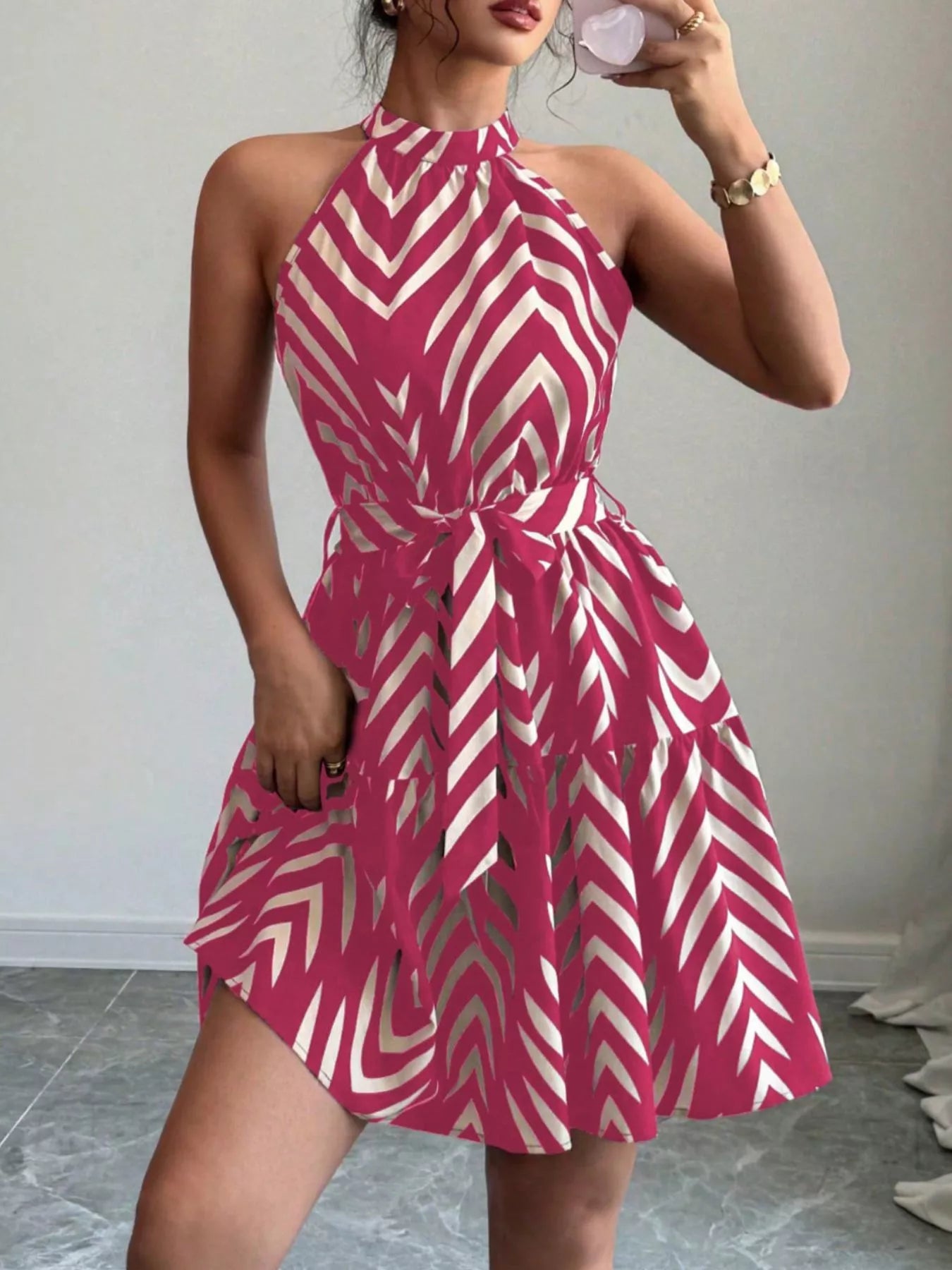 Rose red zebra print halter dress with tie waist and ruffle hem, sleeveless