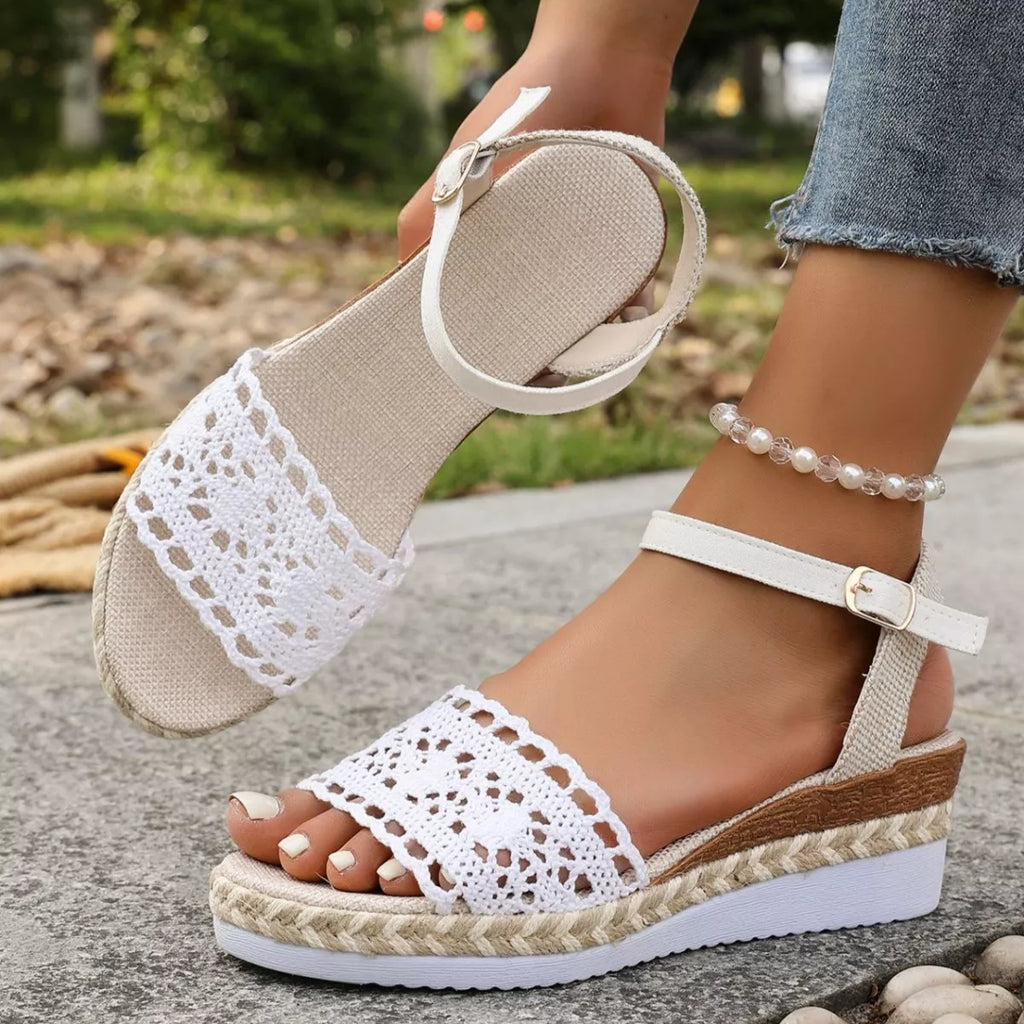 White crochet espadrille wedge sandals with buckle ankle strap and peep-toe