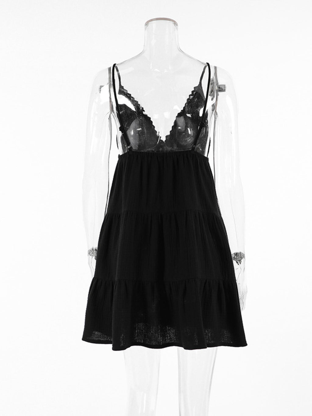 Black V-neck tiered mini dress with lace bust and spaghetti straps, tiered silhouette