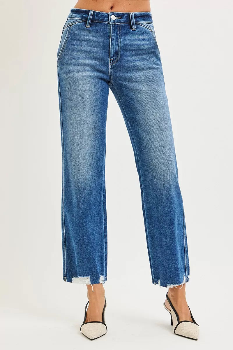 Medium wash high-rise straight jeans, button fly, raw ankle-fray hem