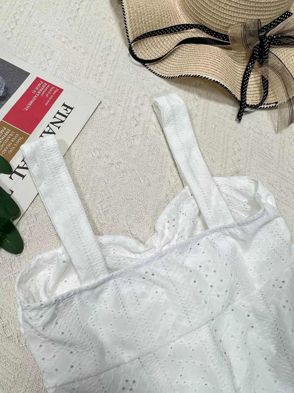 White eyelet embroidered cami top, front view with drawstring tie at bust