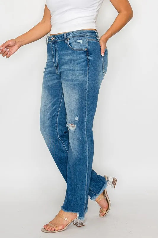 Front view of medium-wash straight jeans with ripped knee detail and raw hem