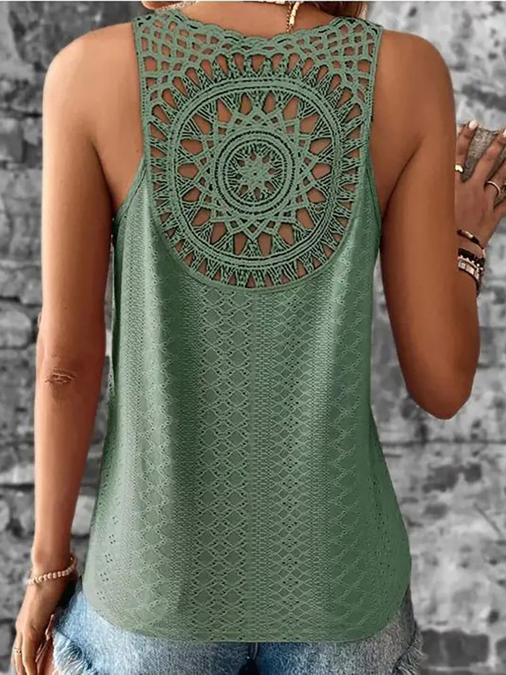 Sage green eyelet lace back tank top with circular crochet pattern at upper back.