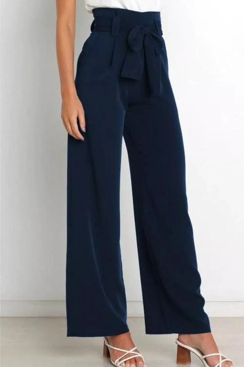 Dark navy high-waist wide-leg pants with front tie bow and wide straight legs