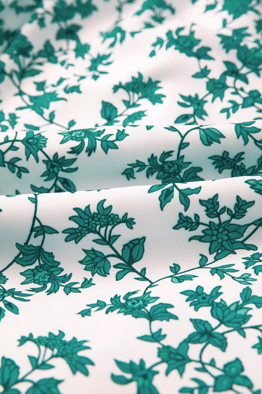 White fabric with turquoise floral print pattern for shirred cami maxi dress