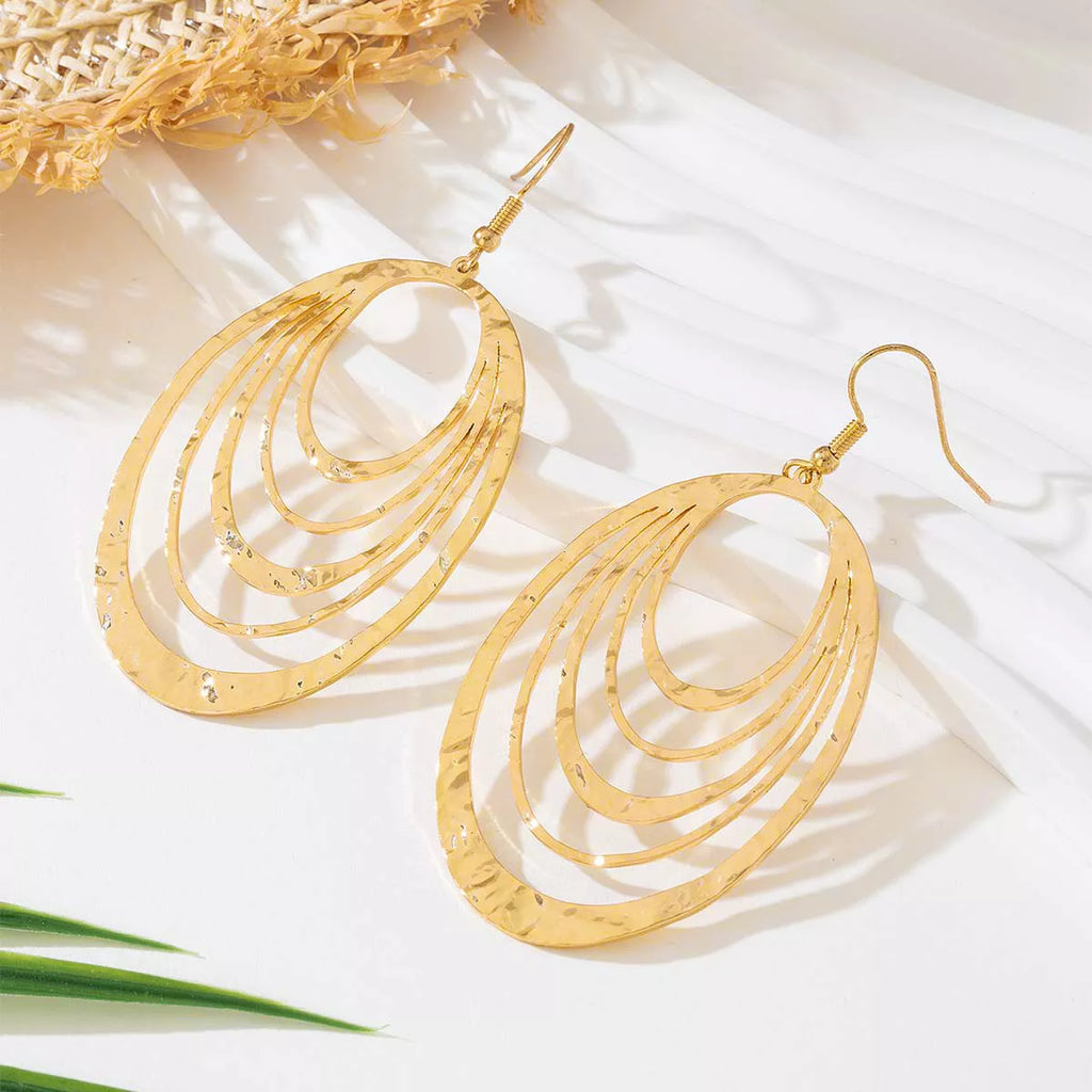 Gold-plated oval layered hoop earrings with open center and dangling fishhook backs