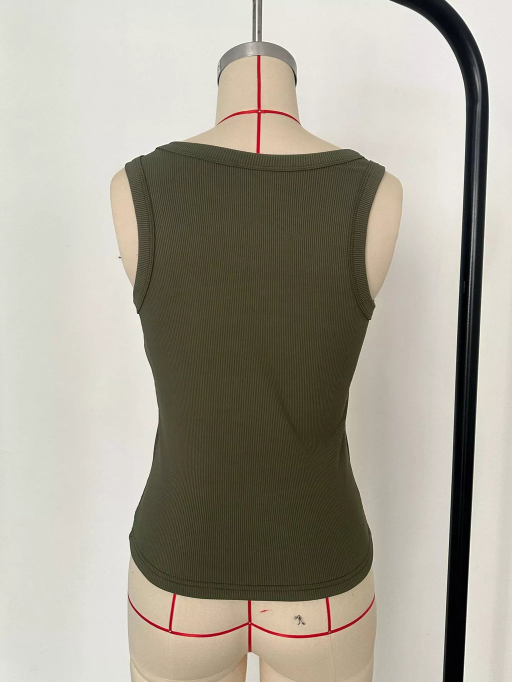 Army green ribbed knit slim-fit tank, scoop back view on mannequin