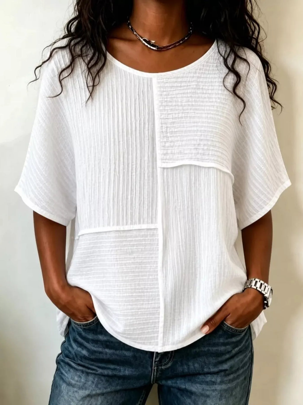 White textured round-neck half-sleeve blouse with vertical seam panel detail
