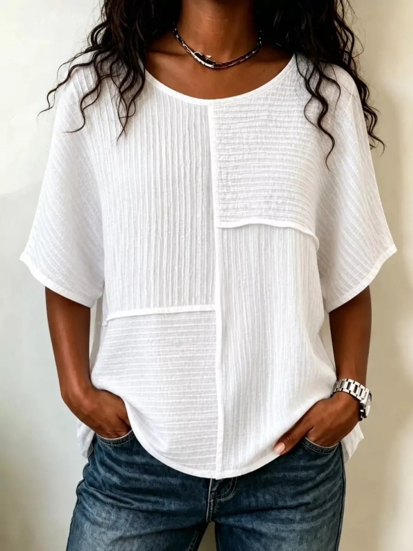 White textured round-neck half-sleeve blouse with vertical seam panel detail