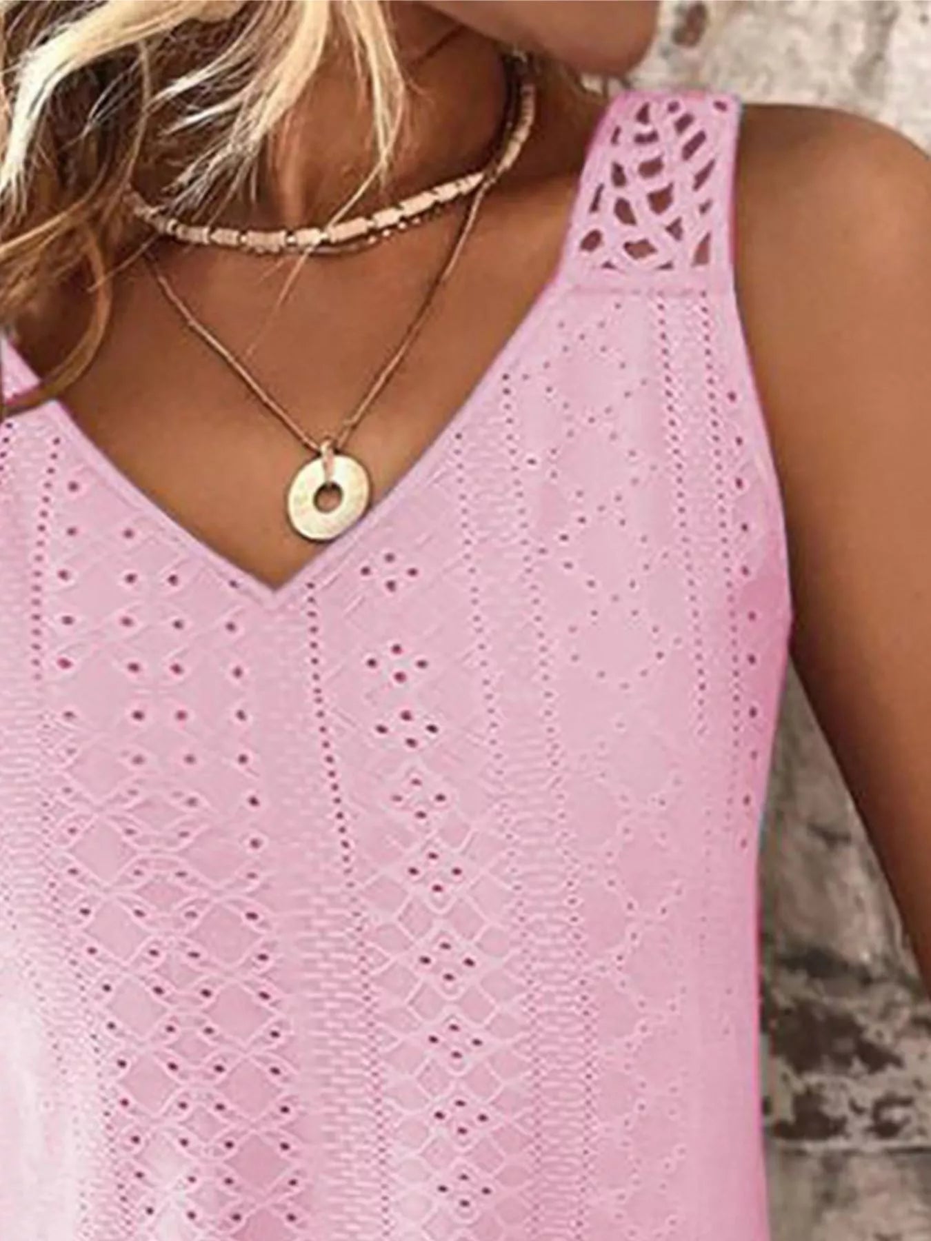 Dusty pink eyelet lace V-neck tank top close-up with front openwork dots