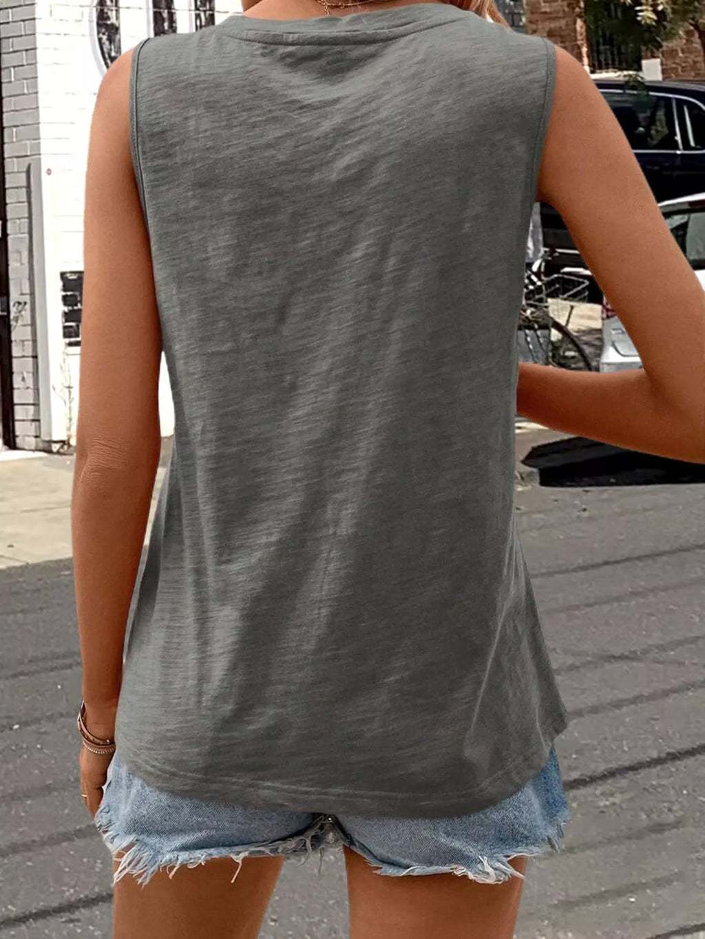 Grey sleeveless tank top with plain back and rounded neckline