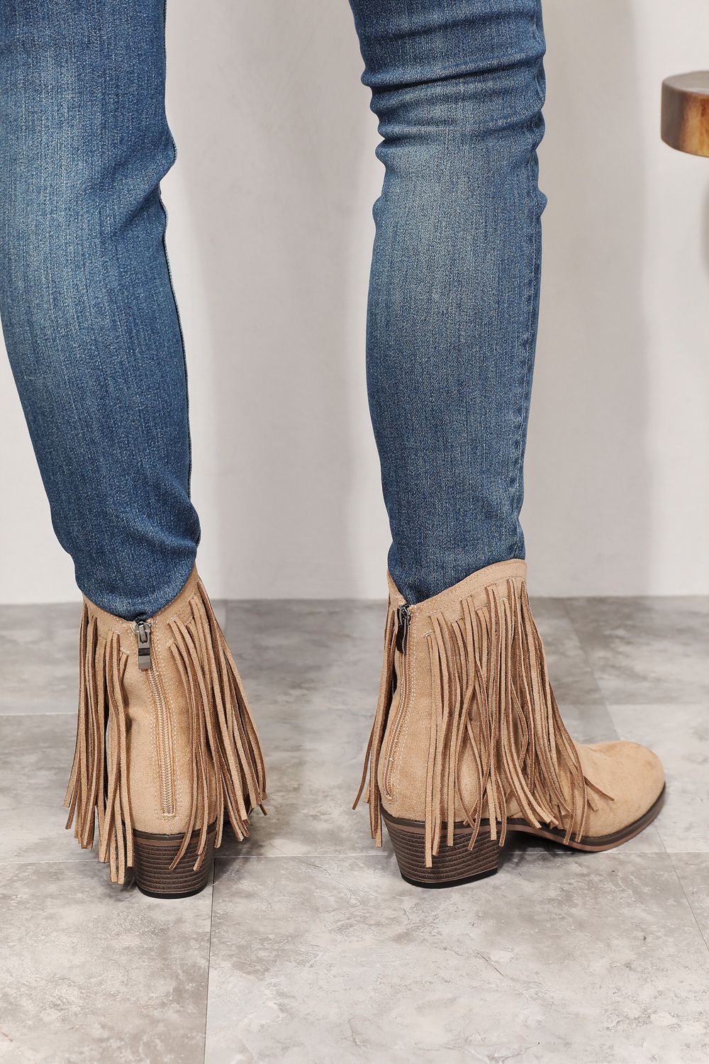 Khaki suede ankle boots with fringe, side zipper detail and stacked heel